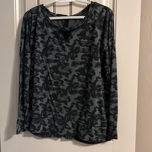 Calvin Klein Performance top.    Green and black camo.